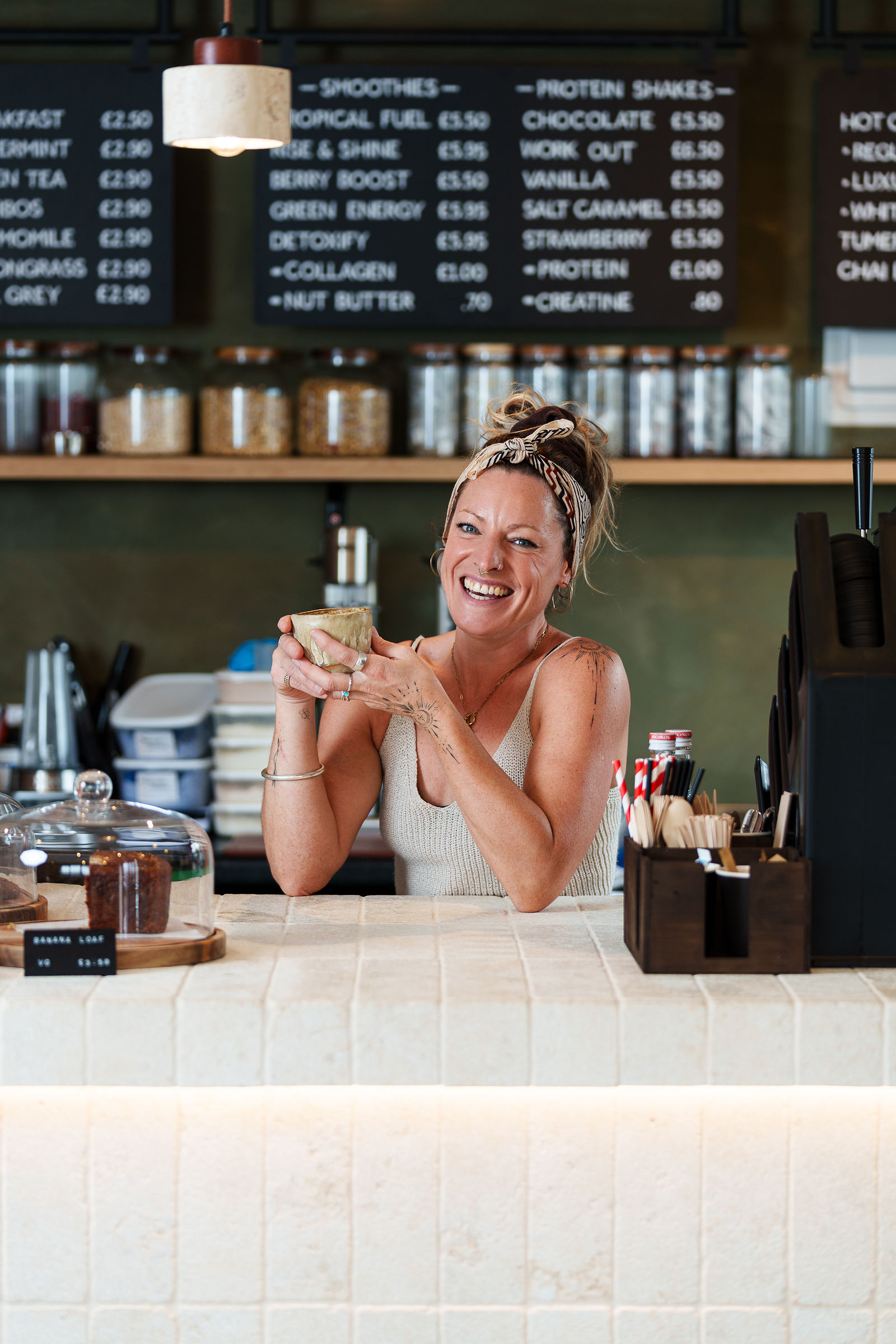 Charlotte, who runs ELEMENTS café, behind the counter in St Ives